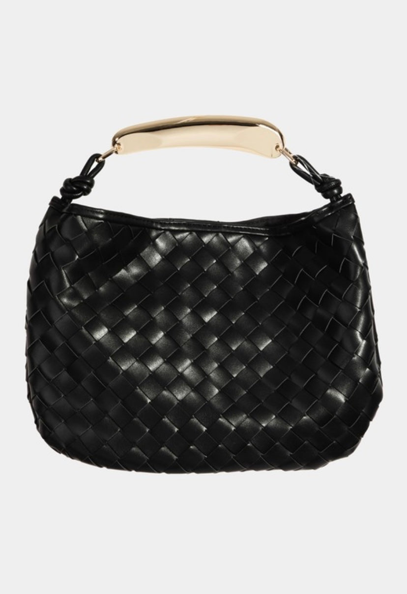 Black woven handbag with a gold handle