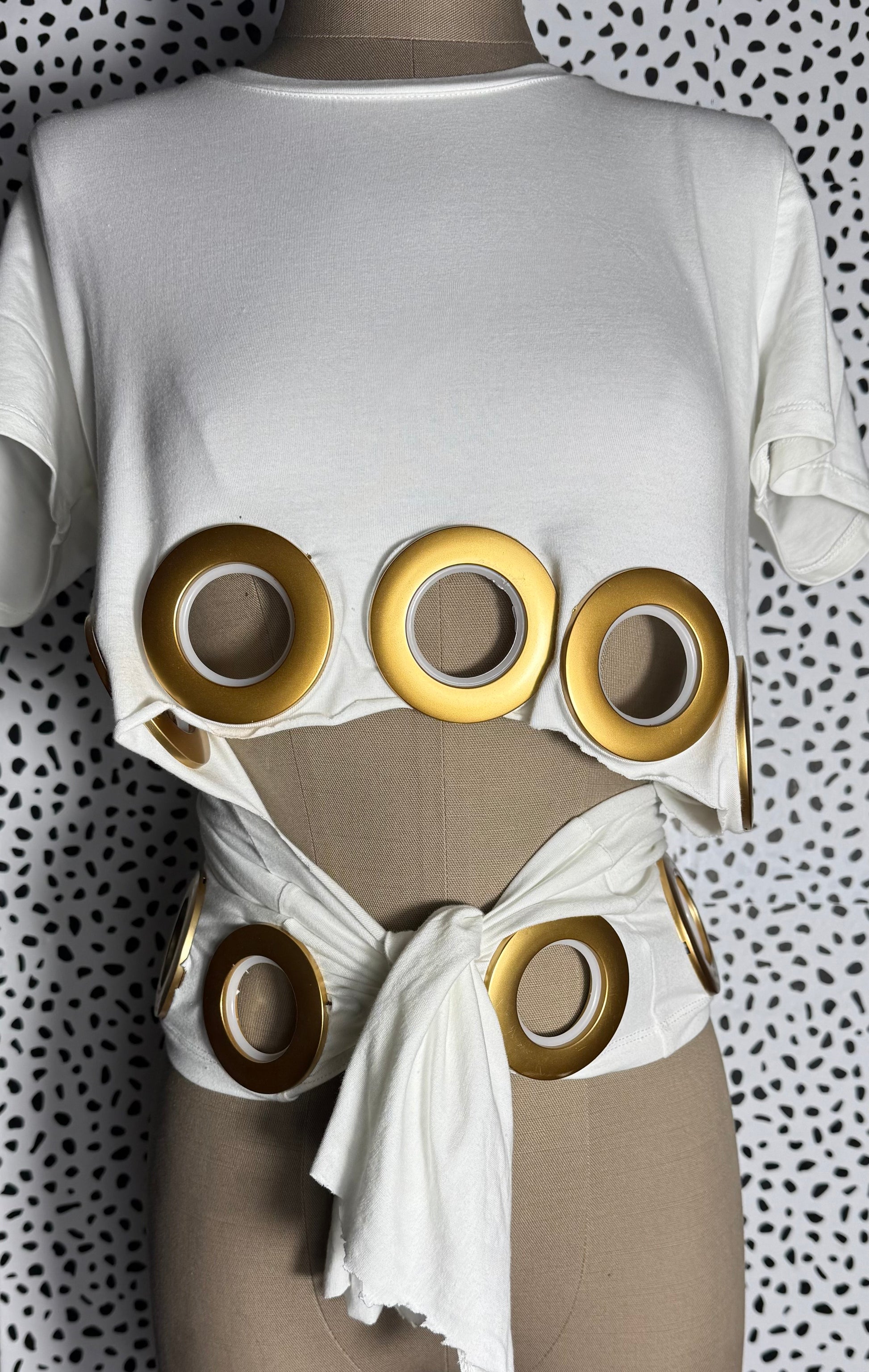 women's White top with gold grommet details- concert or date night outfit